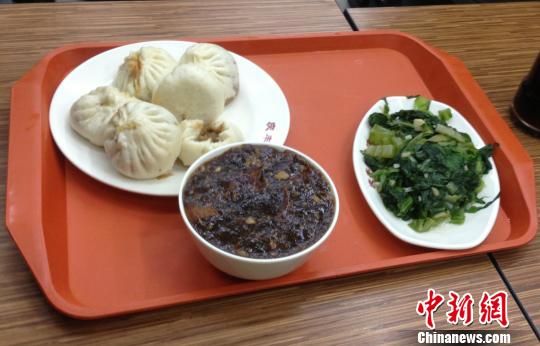 習近平京城小店排隊吃包子店員憶現(xiàn)場連稱沒想到