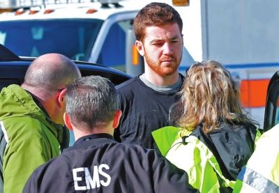 嫌犯接受詢問。新華社/美聯(lián)